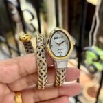 Luxury Snake-Inspired Wrap Watch – Emerald Green & Dual-Tone Finish