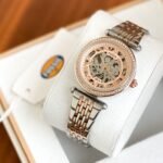 Women’s Sleek Automatic Skeleton Watch – 34mm Gold & Silver Edition